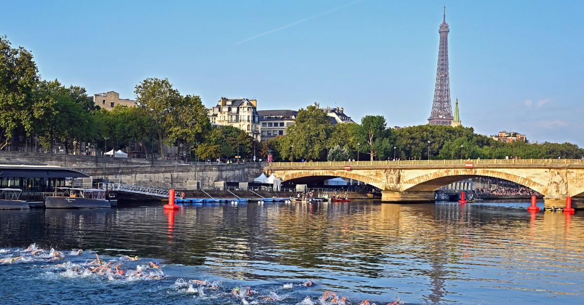 Athletes swim in the Seine River in August 2023